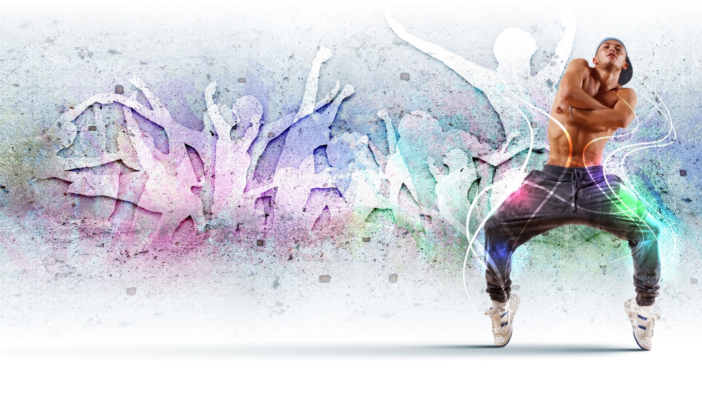 Парень танцор на фоне стены 