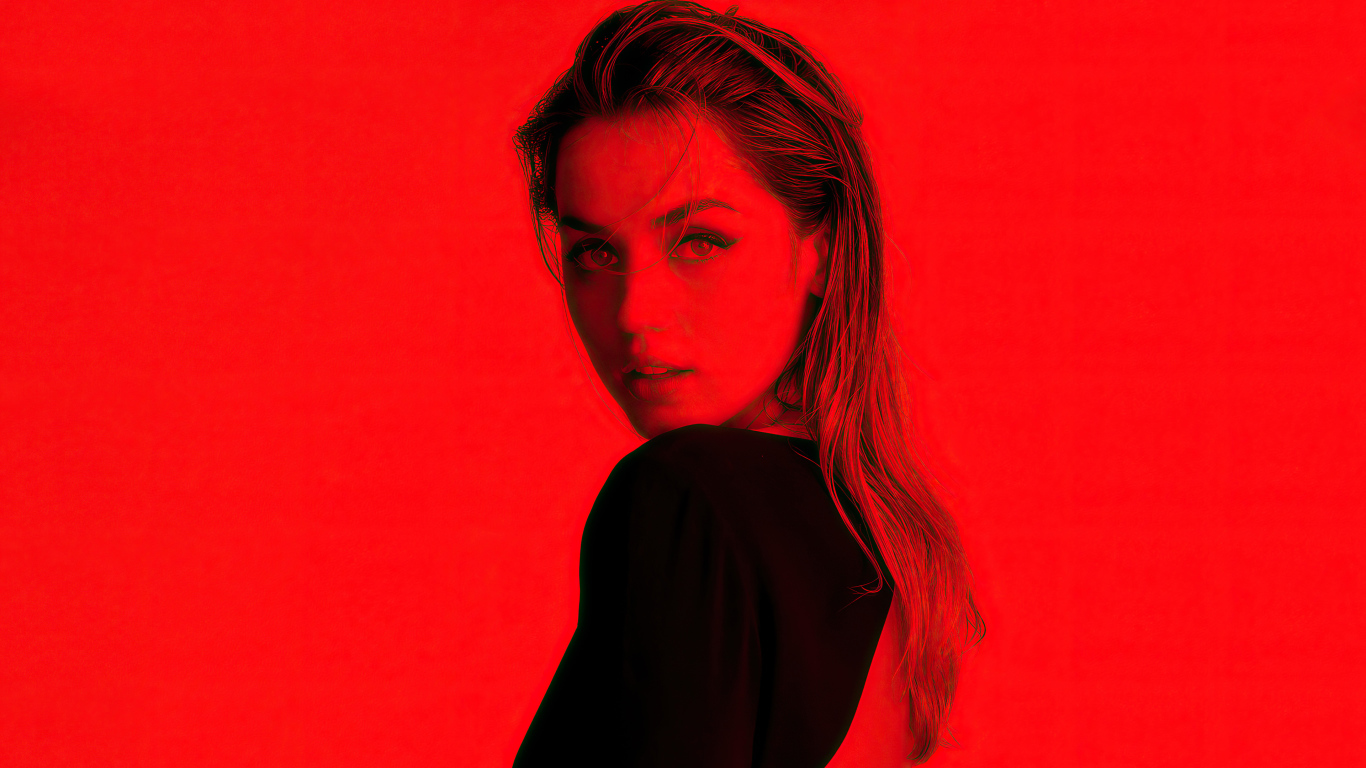 Испанская актриса Ана де Армас на красном фоне