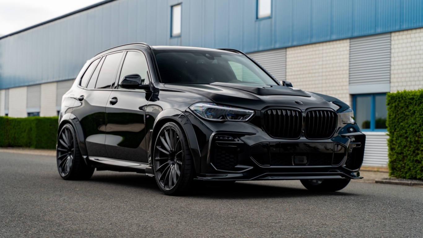 Черный автомобиль Prior-Design PDG5XWB Widebody Aerodynamic Kit