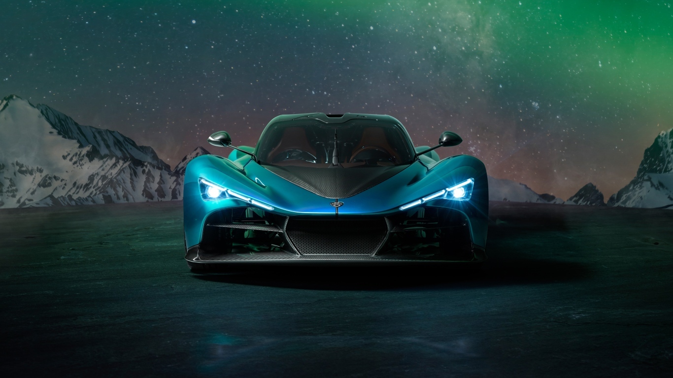 Вид спереди на дорогой автомобиль Zenvo Aurora Agil  ночью