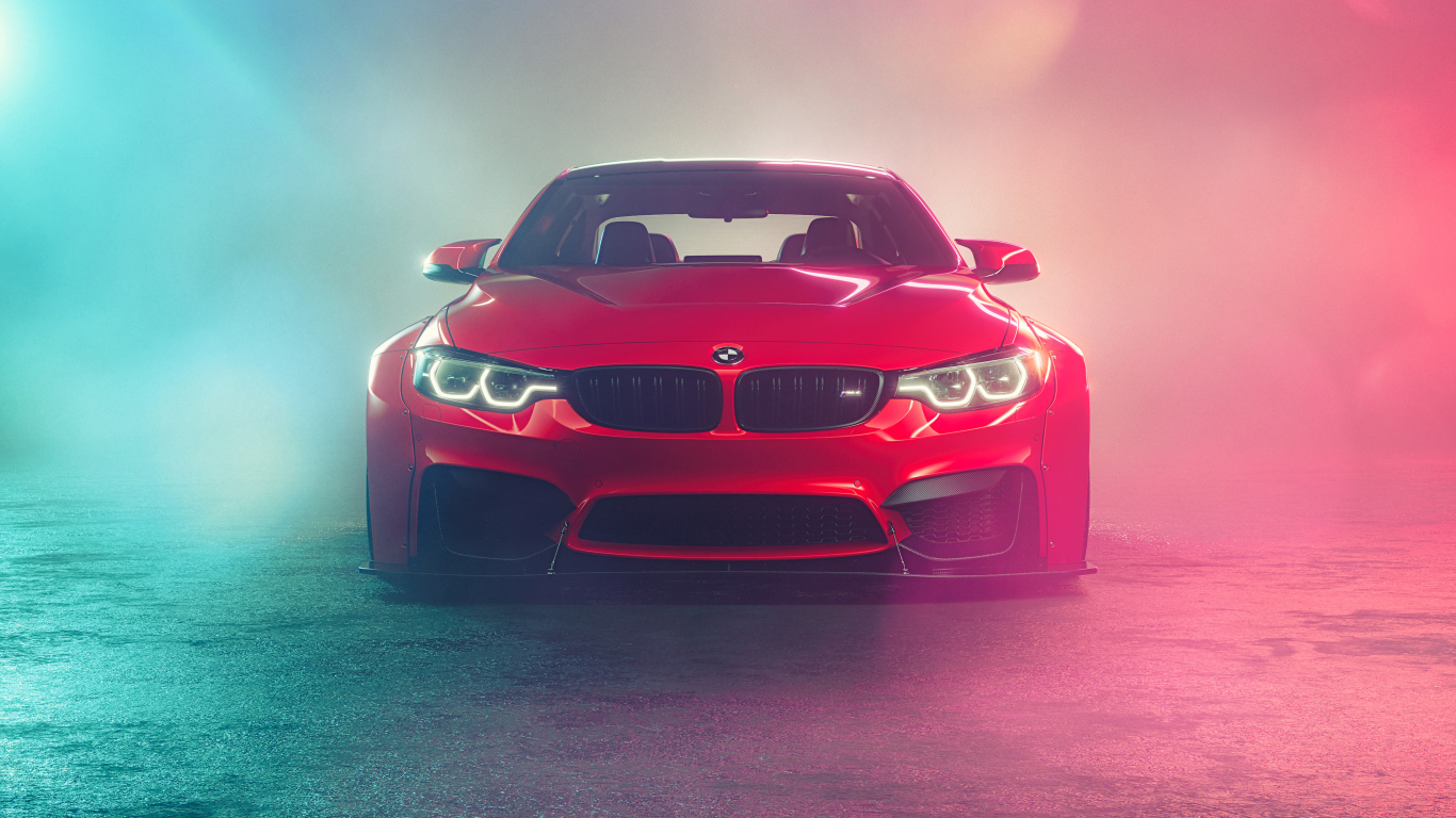 Красный автомобиль BMW M4  в дыму