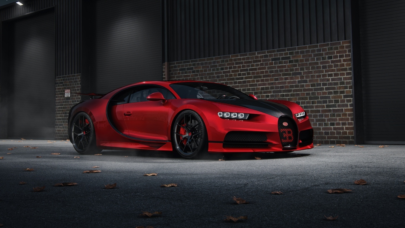 Красный автомобиль Bugatti Chiron CGI у кирпичной стены