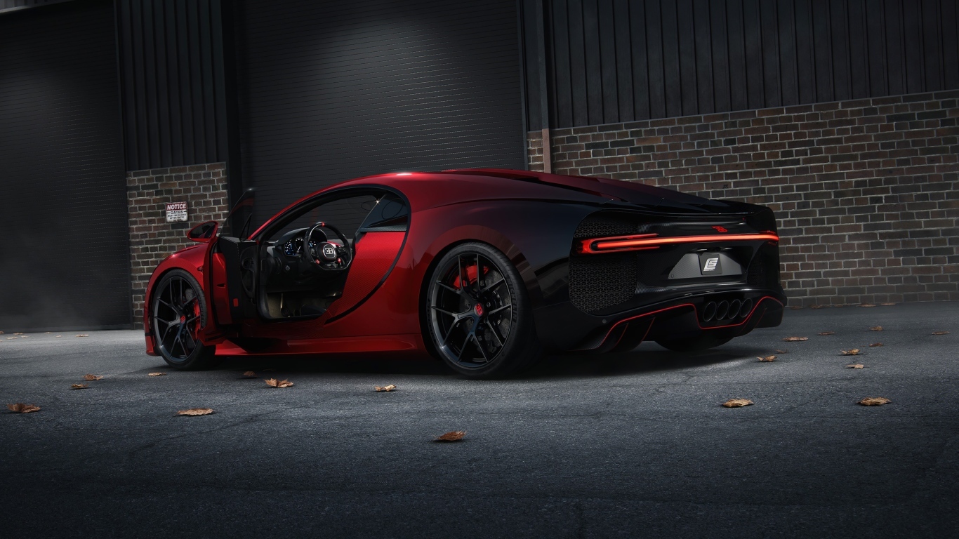 Красный дорогой автомобиль Bugatti Chiron вид сзади