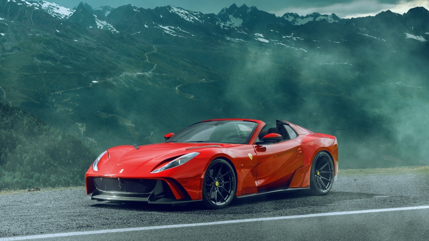 Красный спортивный автомобиль Ferrari 812 GTS N-Largo в горах