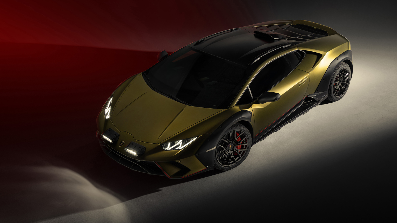 Автомобиль Lamborghini Huracan Sterrato 2023 года на сером фоне