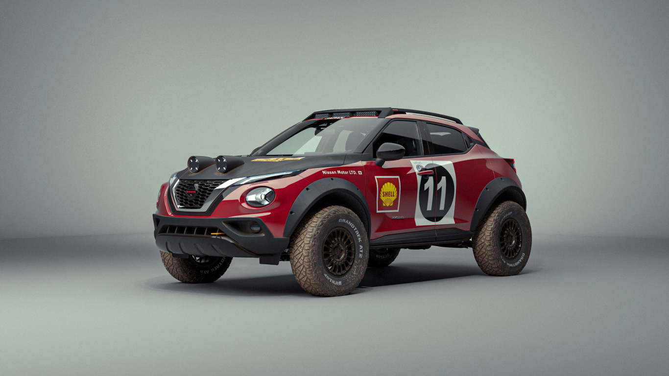 Автомобиль Nissan Juke Rally Tribute Concept 2021 года на сером фоне 