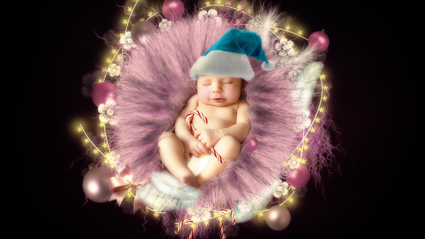 Красивый новорожденный ребенок в колыбели на черном фоне