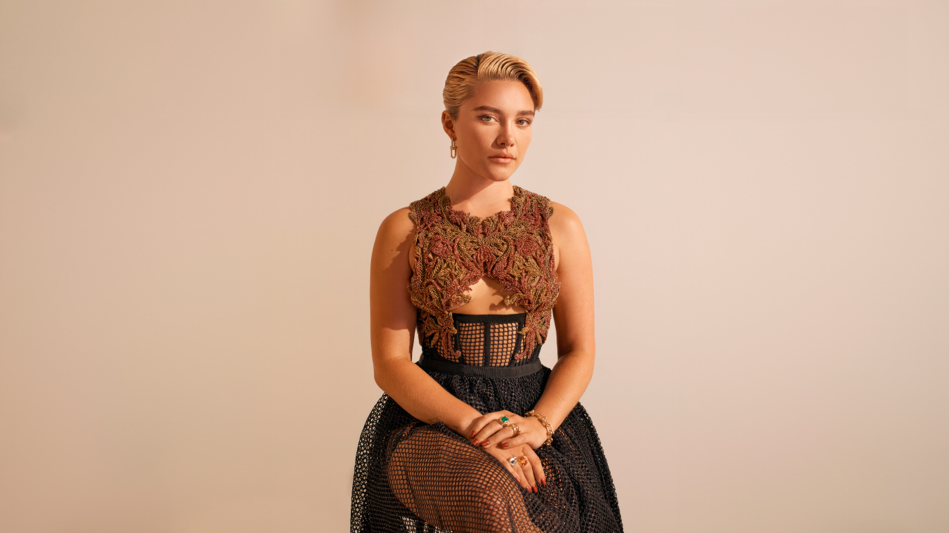 Cute young girl actress Florence Pugh in a dress
