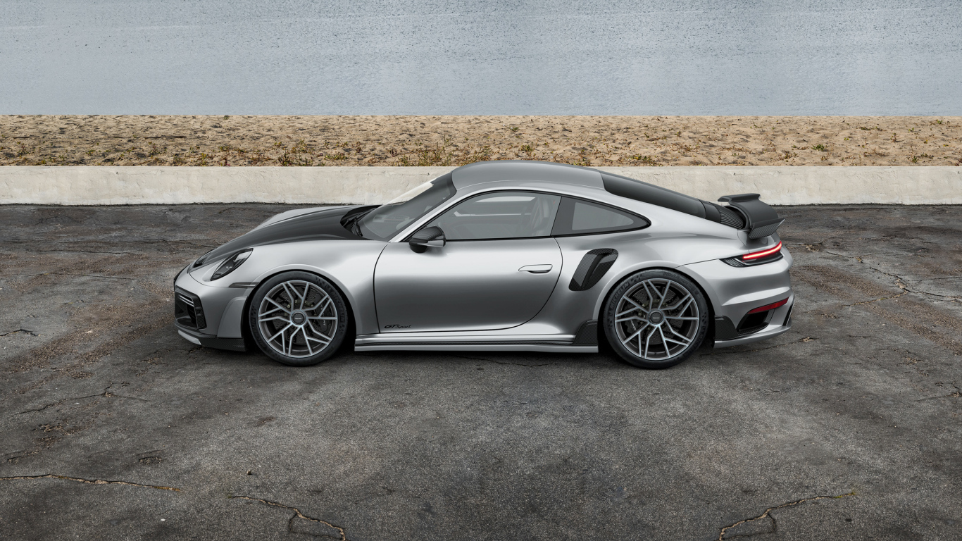 Вид сбоку на серебристый автомобиль TechArt GTsport 2024 года