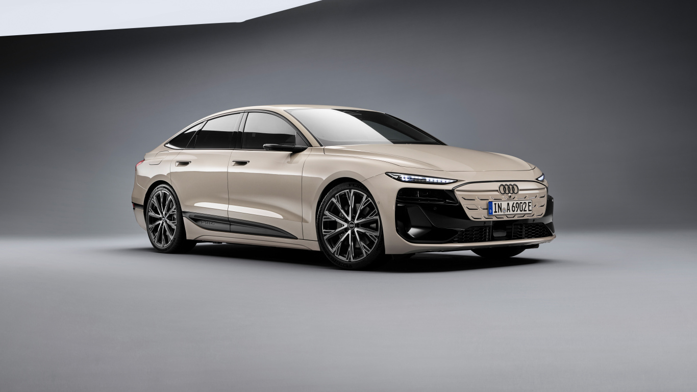 Авто Audi A6 Sportback e-tron performance 2024 года на сером фоне
