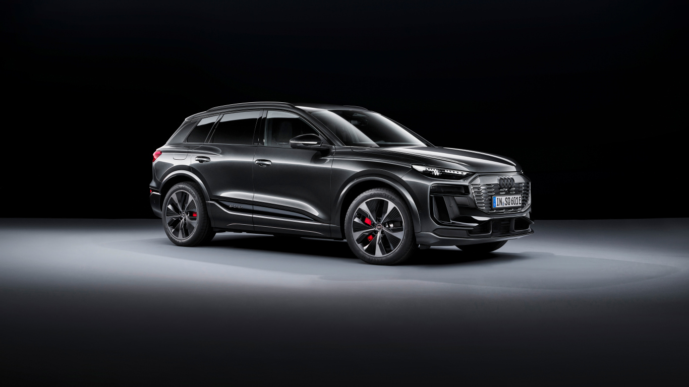 Презентация автомобиля  Audi SQ6 E-Tron 2024  года на черном фоне