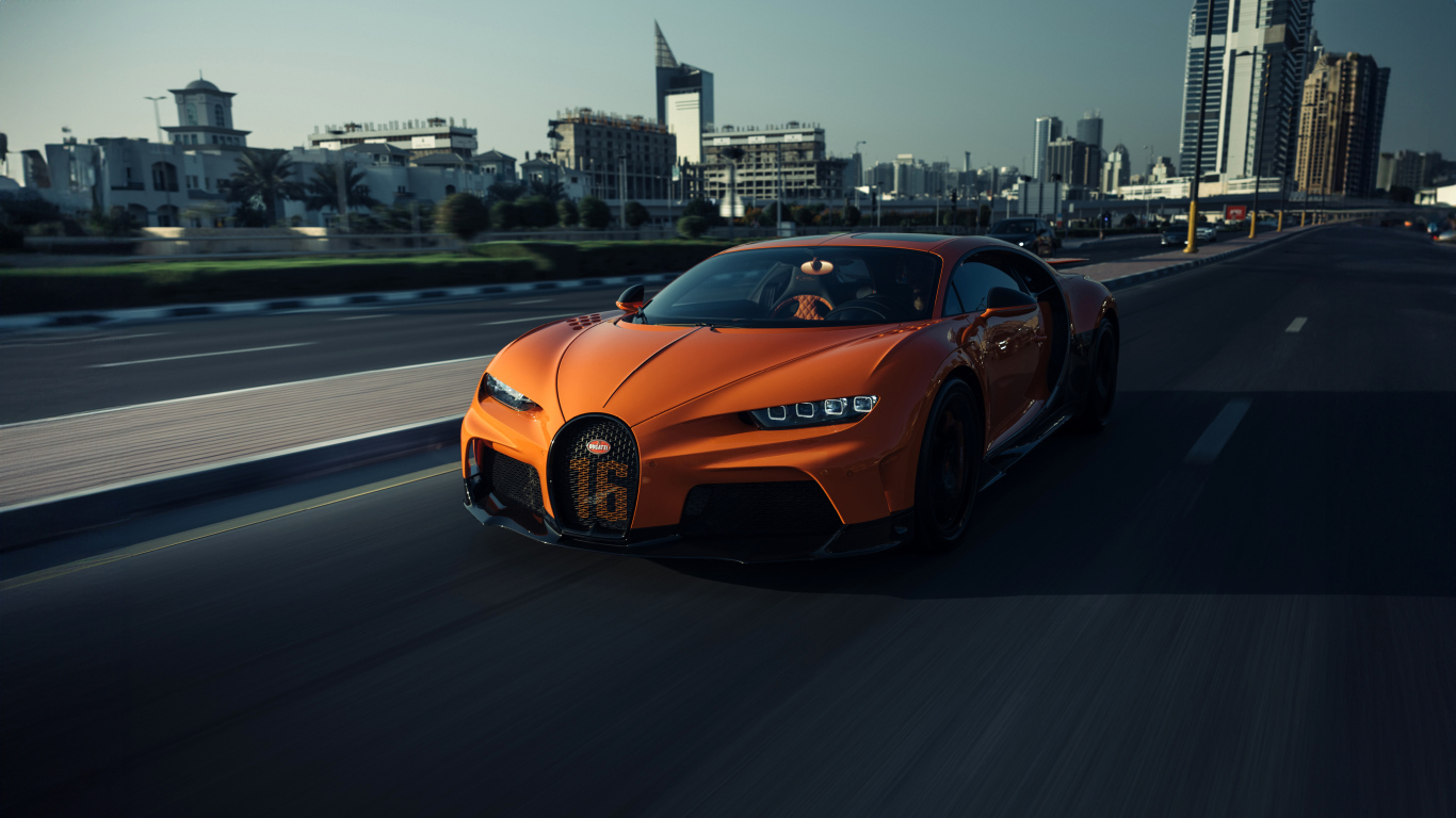 Оранжевый автомобиль Bugatti Chiron Super Sport