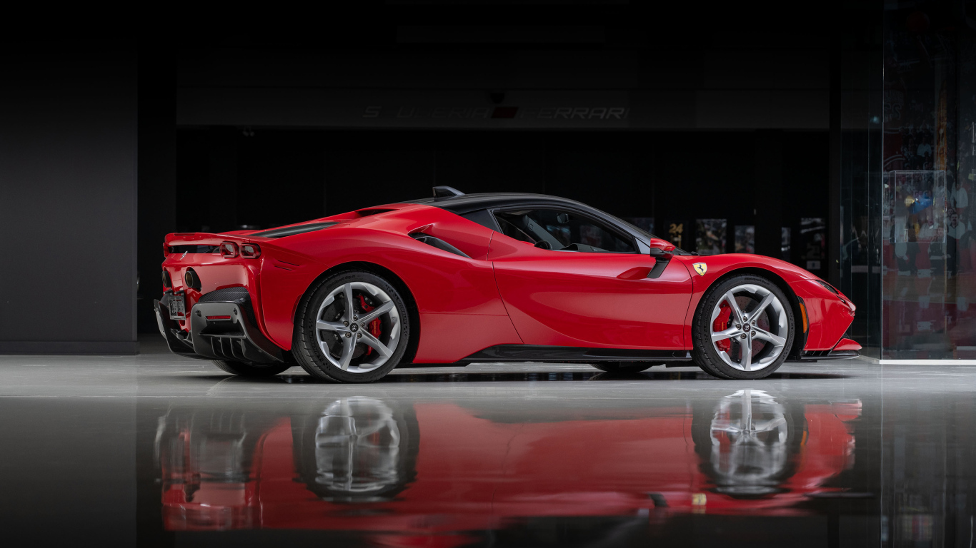 Вид сбоку на красный автомобиль Ferrari SF90 Stradale