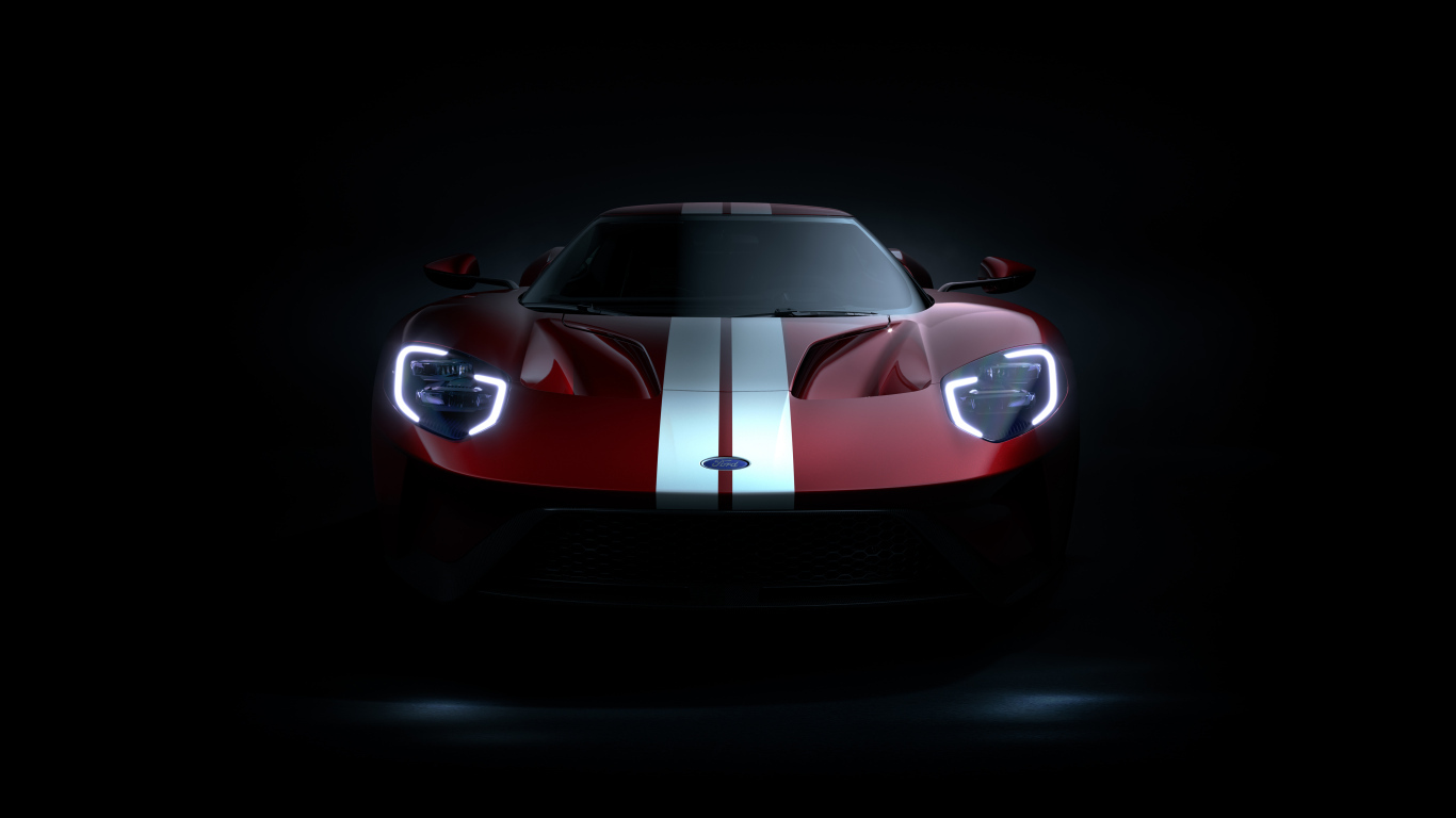 Автомобиль Ford GT на черном фоне
