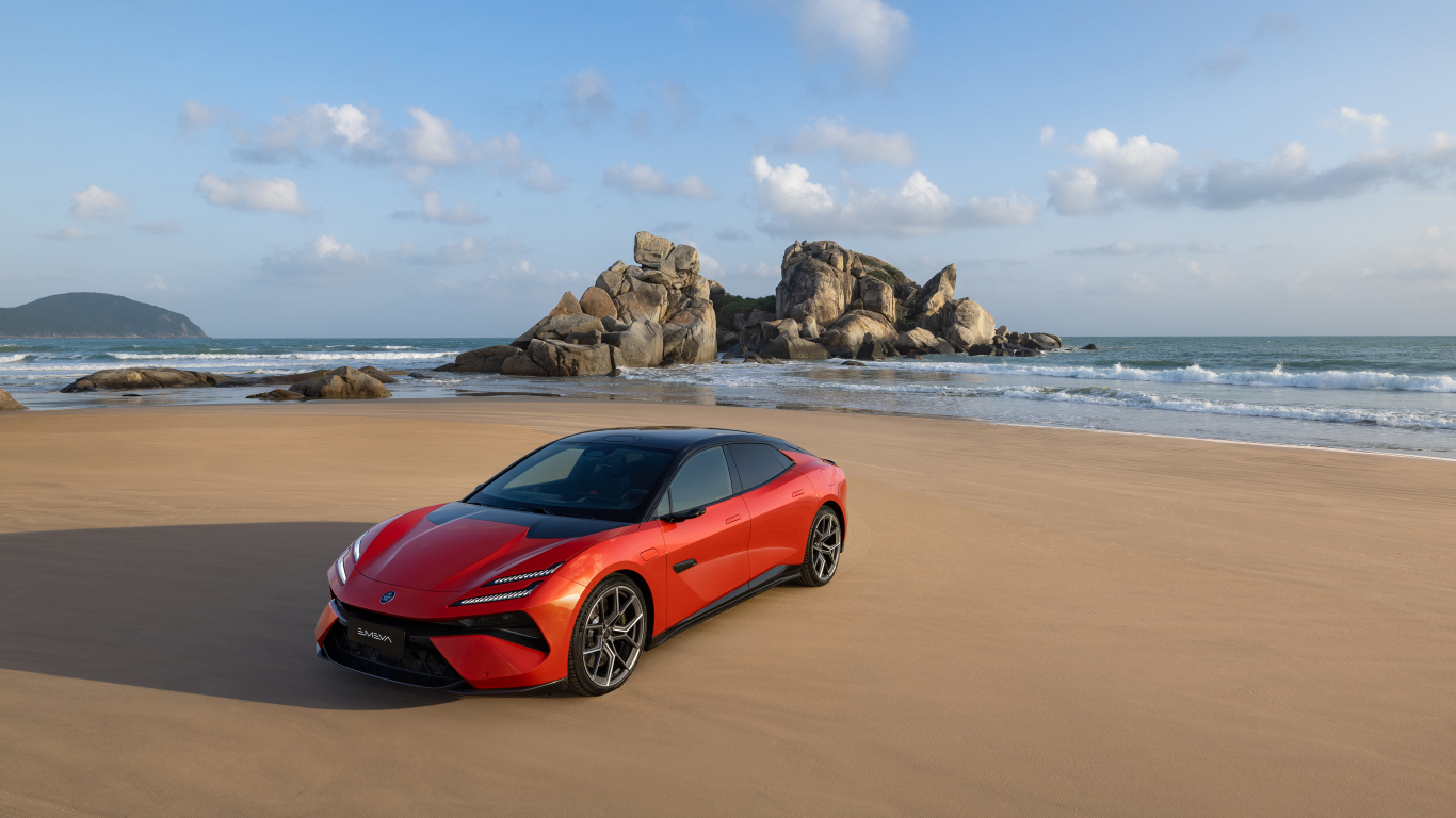 Красный автомобиль  Lotus Emeya R+ 2024 года у моря