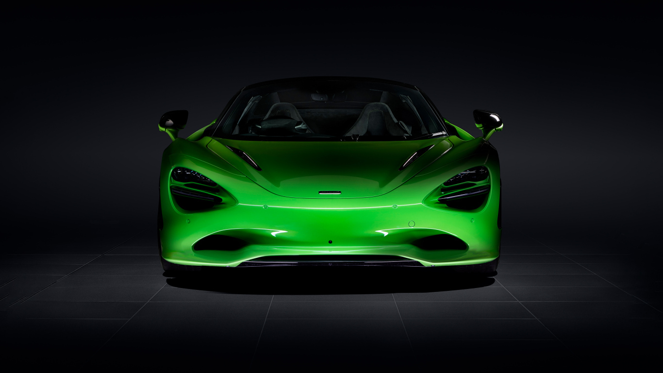 Вид спереди на зеленый автомобиль McLaren 750S
