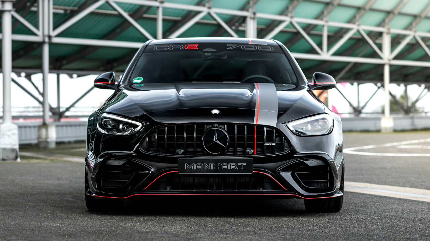 Вид спереди на автомобиль Mercedes-AMG C 63 S E Performance Manhart CRE 700 2024 года