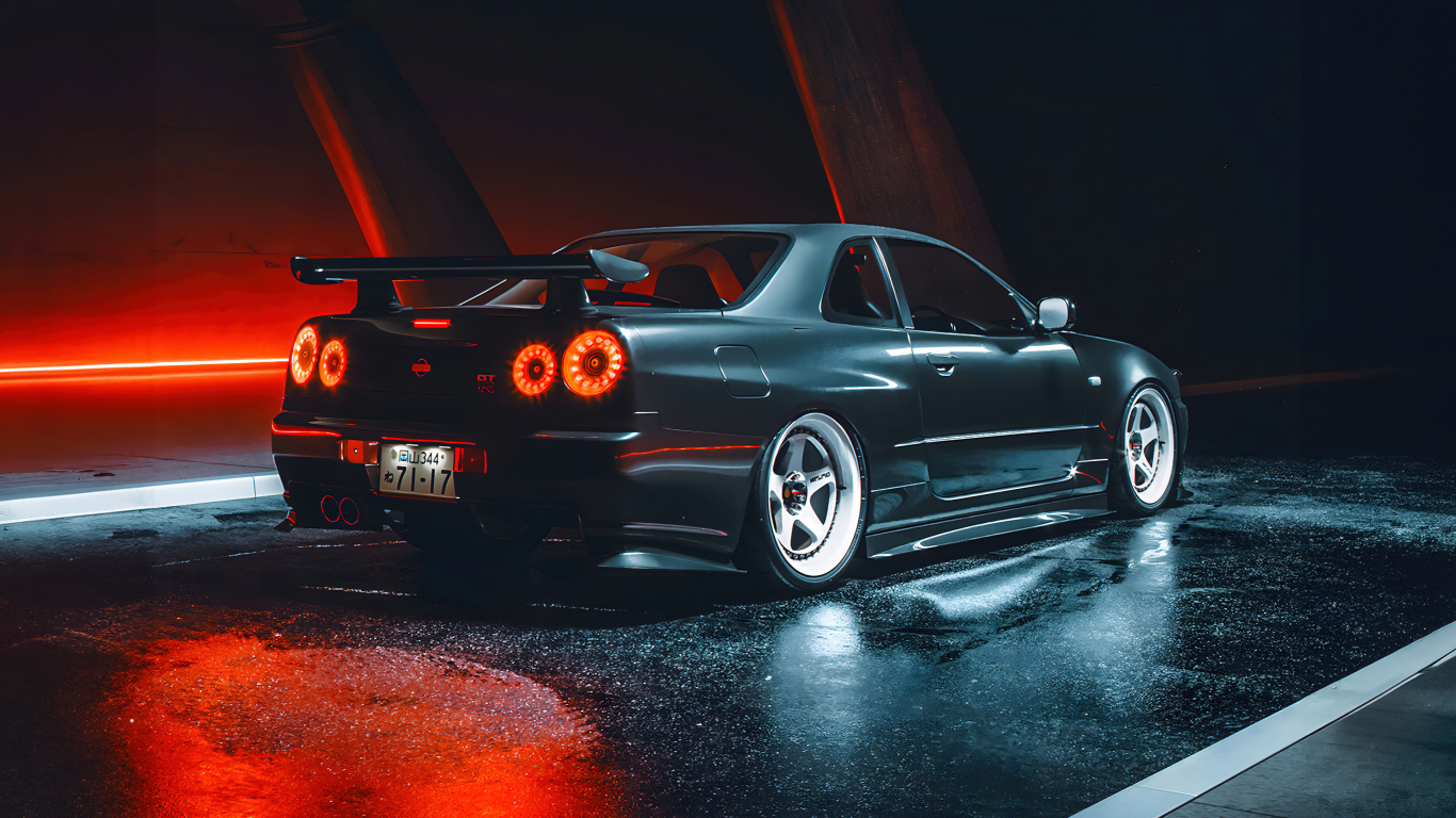 Черный автомобиль Nissan Skyline GTR R35 вид сзади