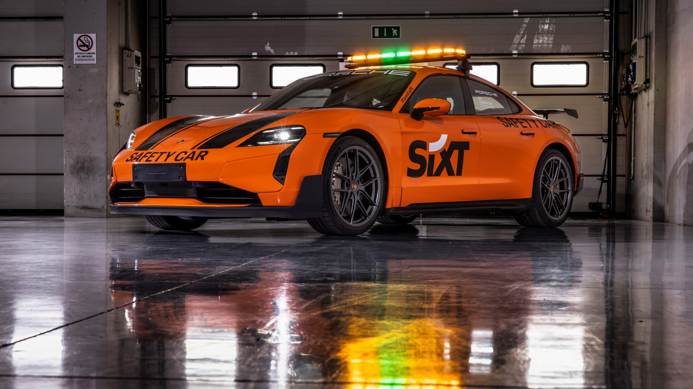 Оранжевый автомобиль Porsche Taycan Turbo GT SIXT Carrera Cup Deutschland Safety Car 2024 года