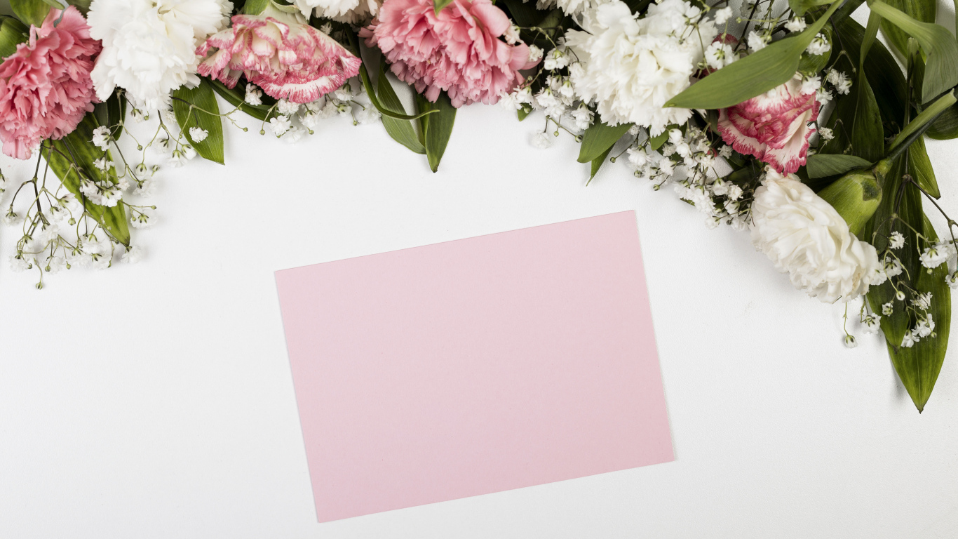 Лист бумаги с цветами гвоздики на сером фоне, шаблон для открытки