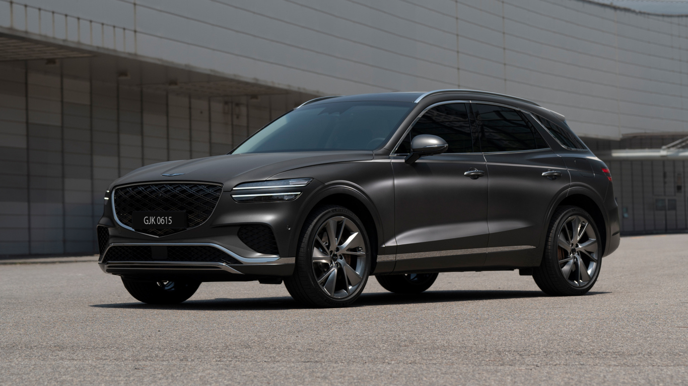 Серый автомобиль Genesis GV70 2024 года