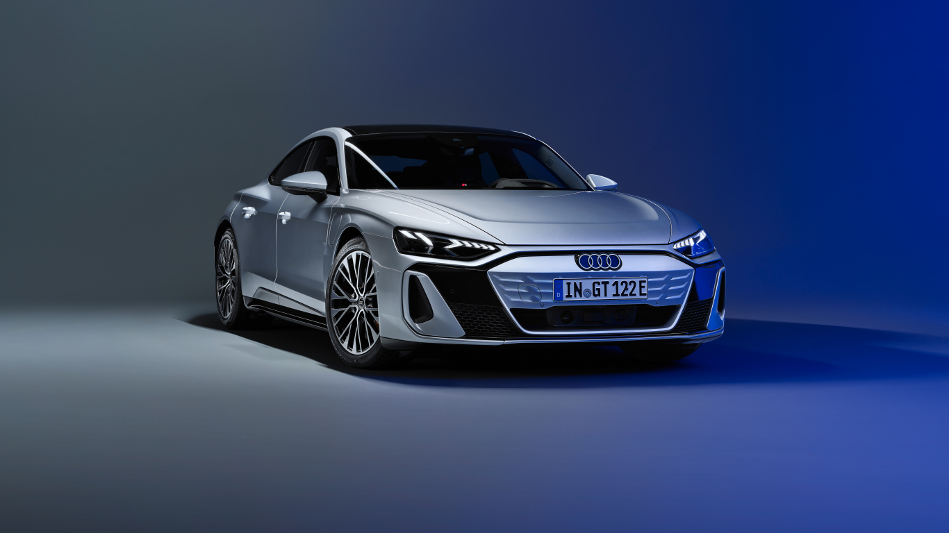 Автомобиль Audi S e-tron GT 2024 года на сером фоне