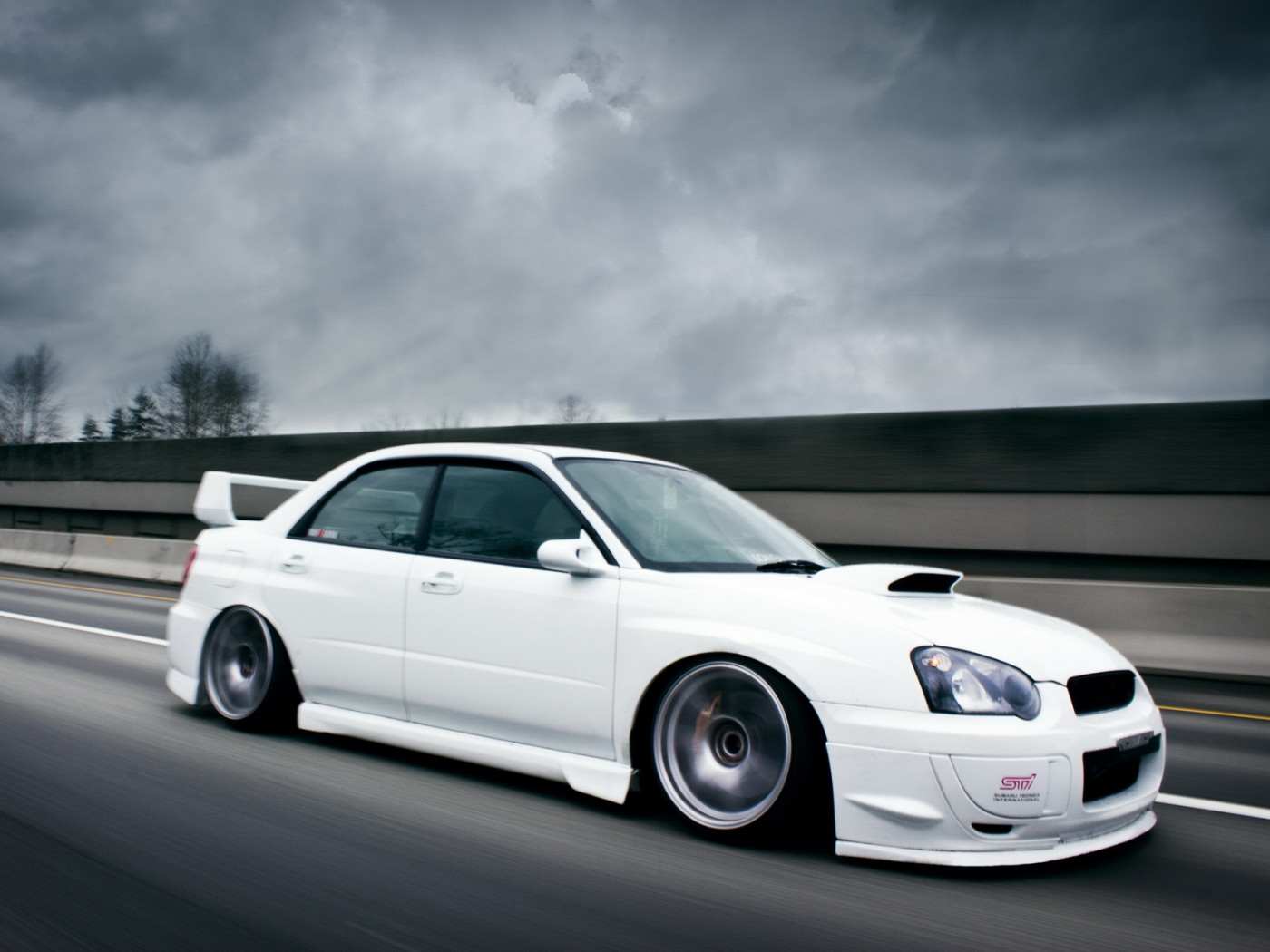 white Subaru Impreza STI