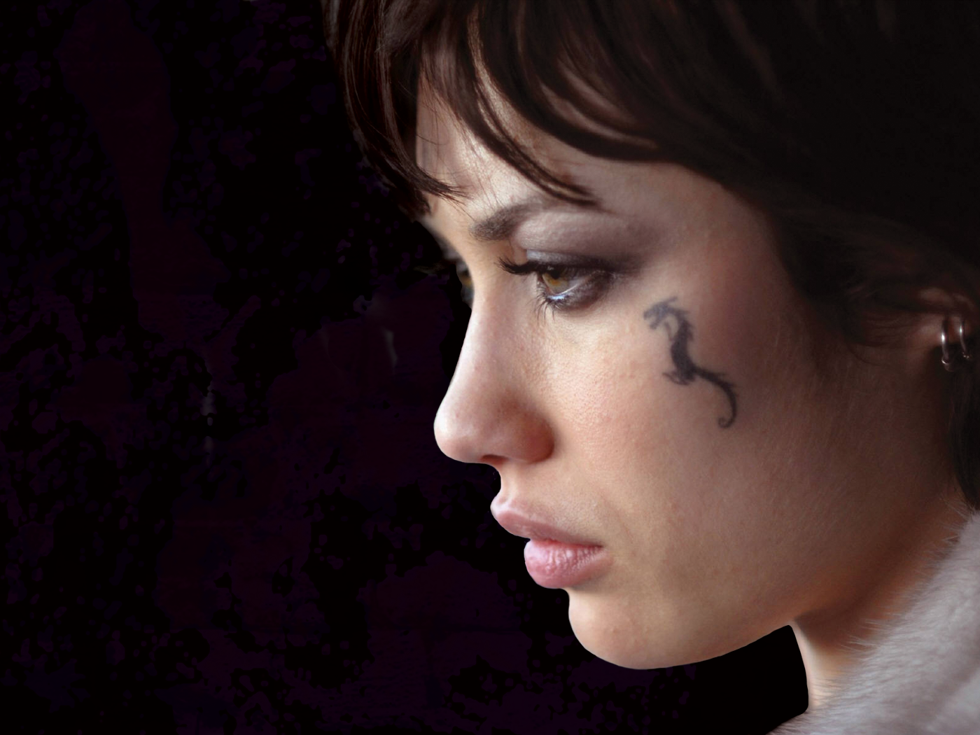 Татуировка дракон на лице