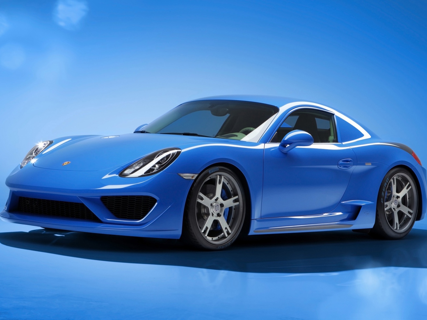 Голубой Porsche Cayman Moncenisio