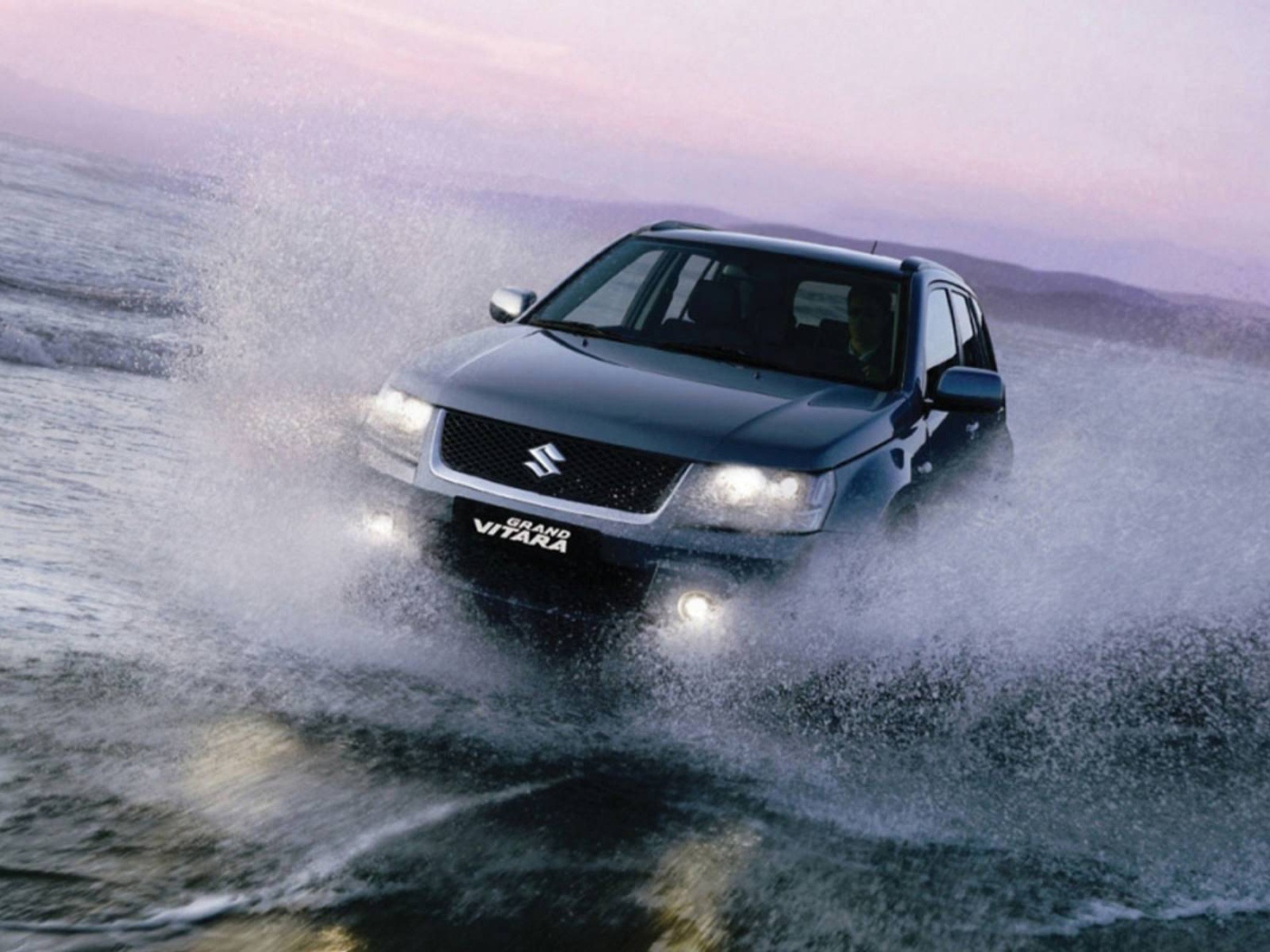 Надежная машина Suzuki Grand Vitara 2014