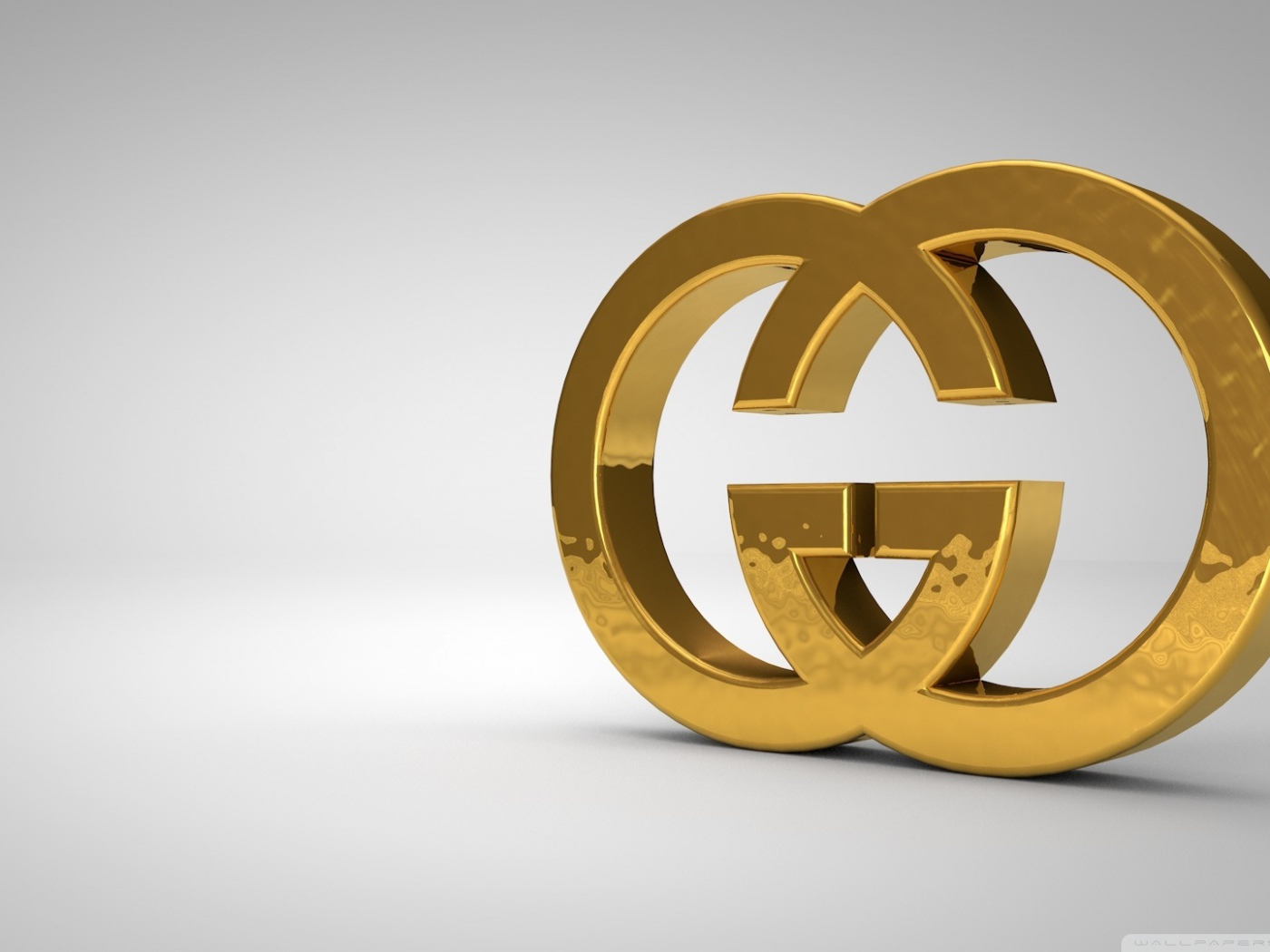 Золотой символ Gucci