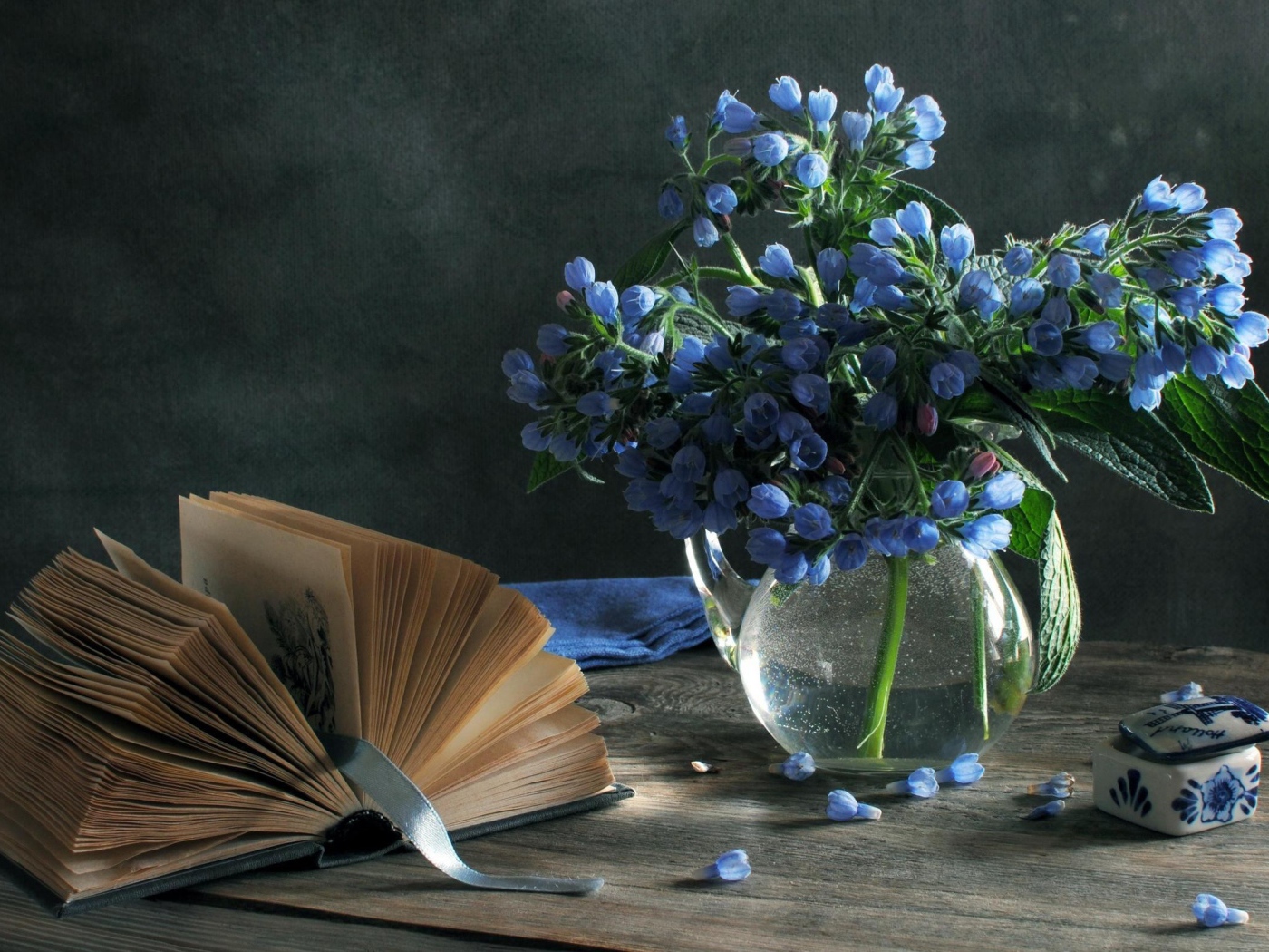 Blue flowers and a book