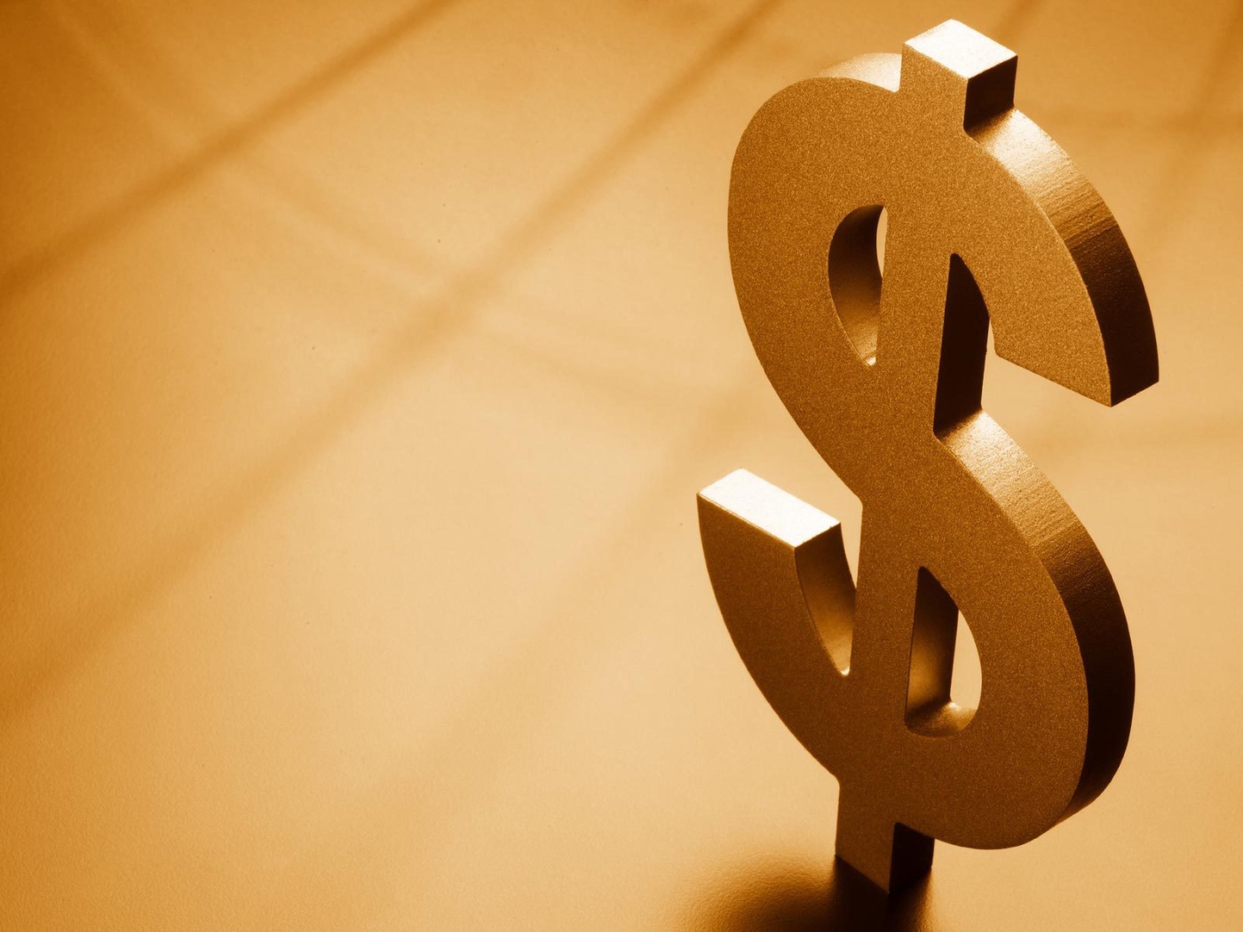 Металлический знак доллара
