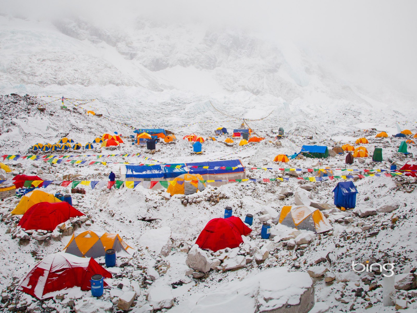 	   Multi-colored tents in the mountains