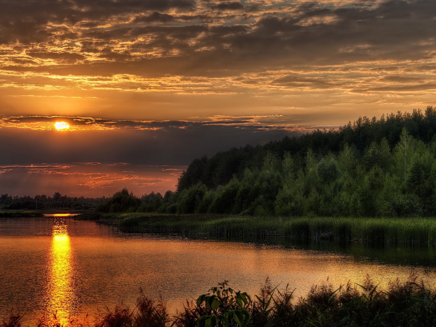 Закат солнца за тучу