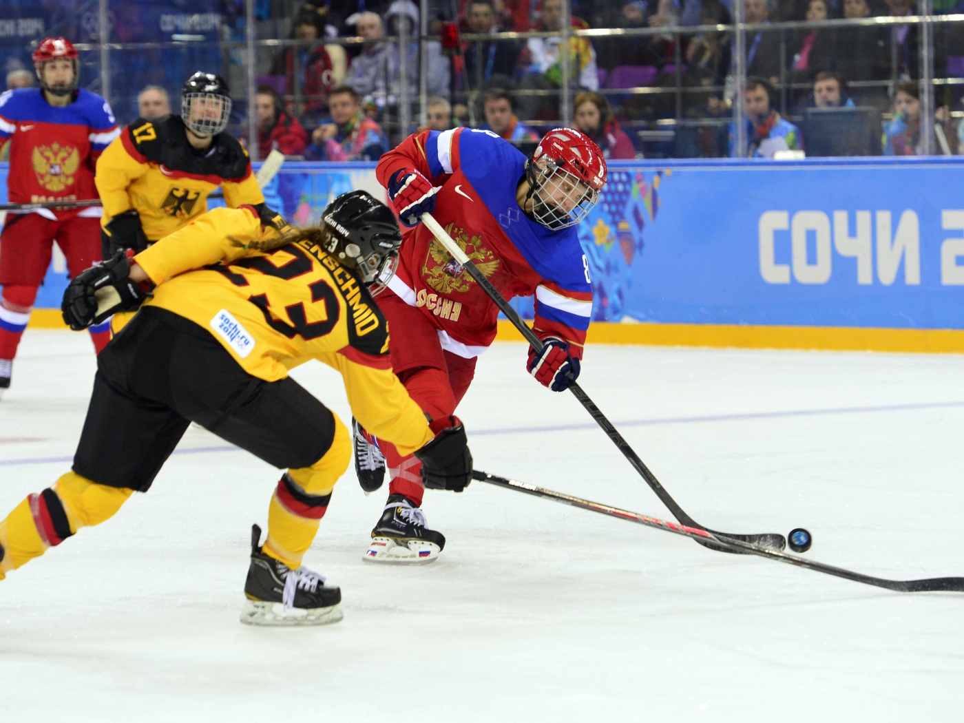 Fighting for the puck in ice hockey at the Olympic Games in Sochi