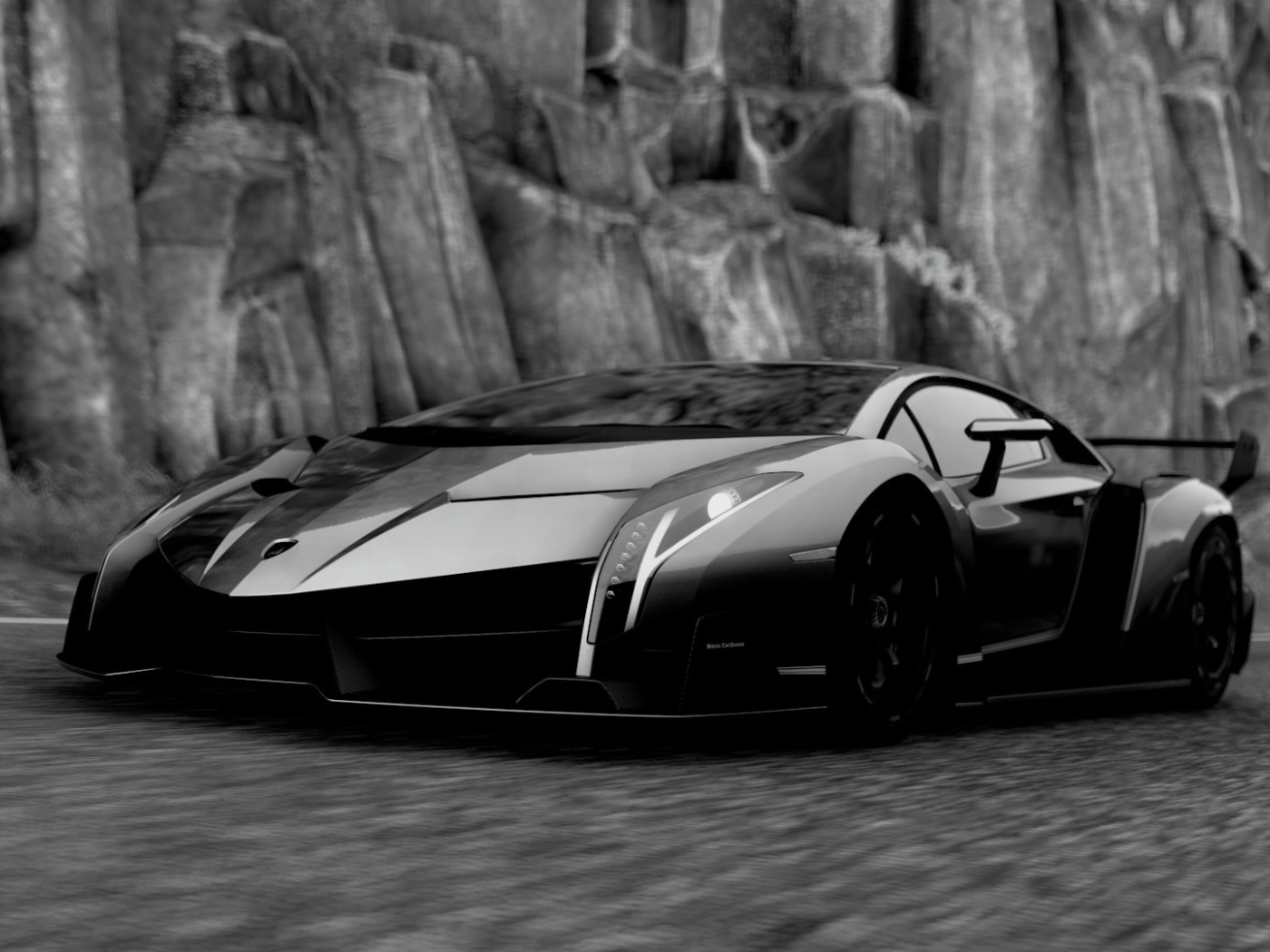 Черный Ламборгини у каменной скалы