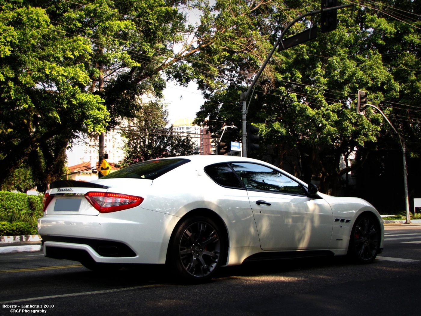 White Maserati on a city street