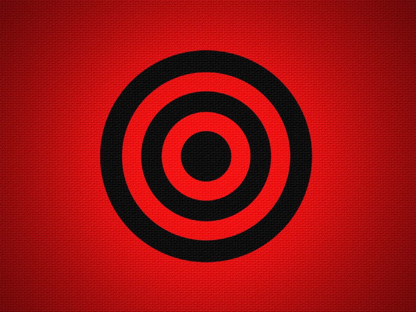 Черная мишень на красном фоне