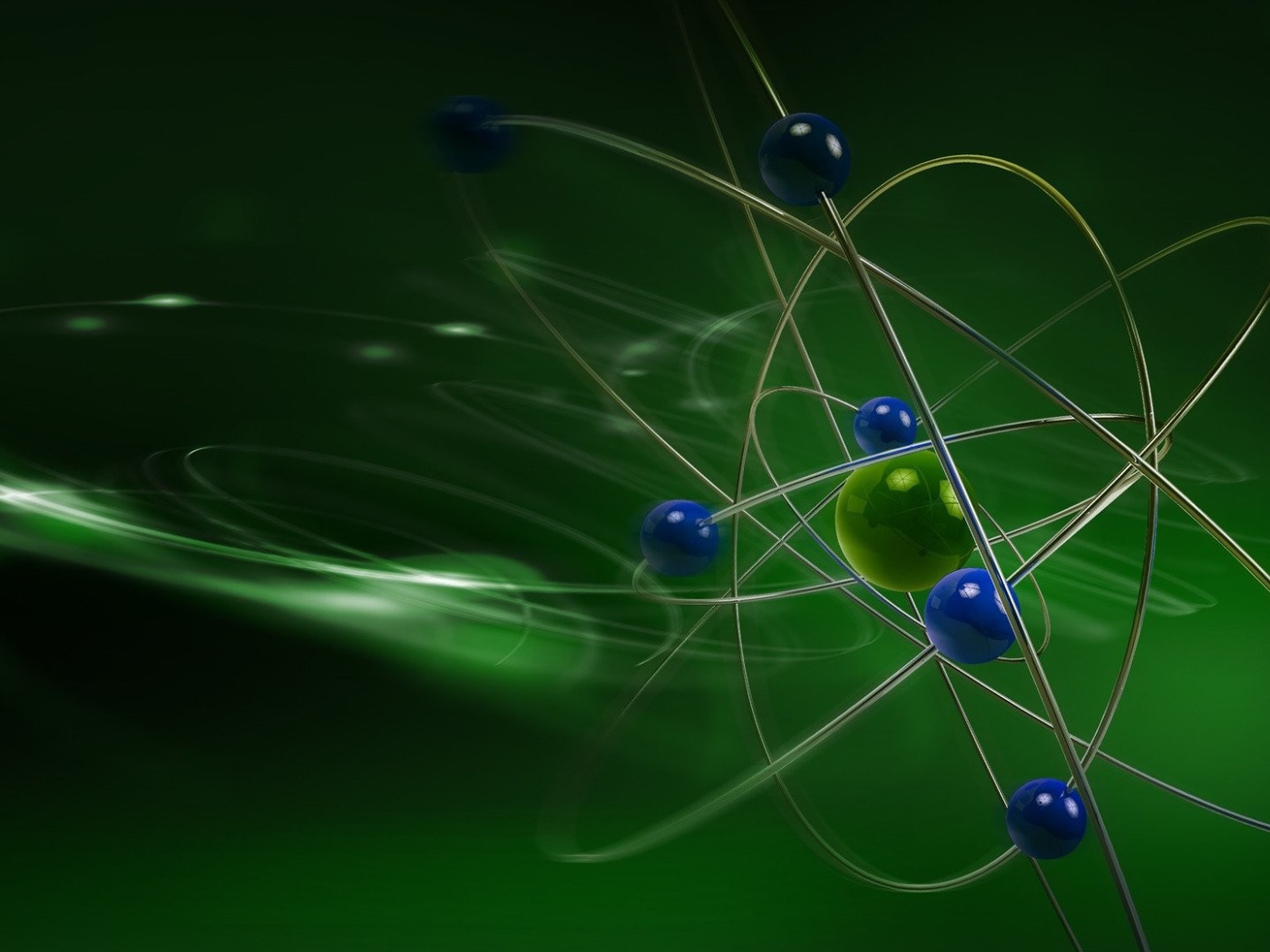 Модель атома на зеленом фоне