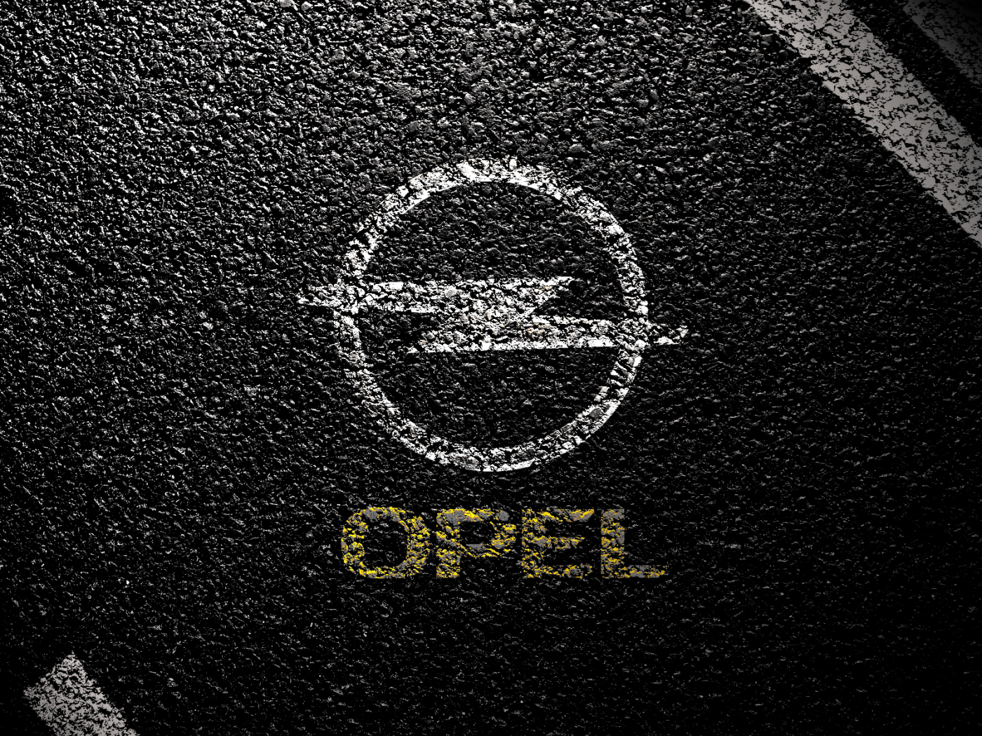 Символ Опель на асфальте