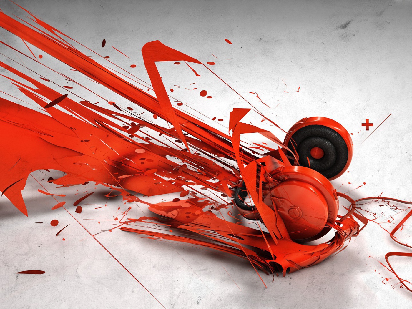 Красные наушники во всплеске краски