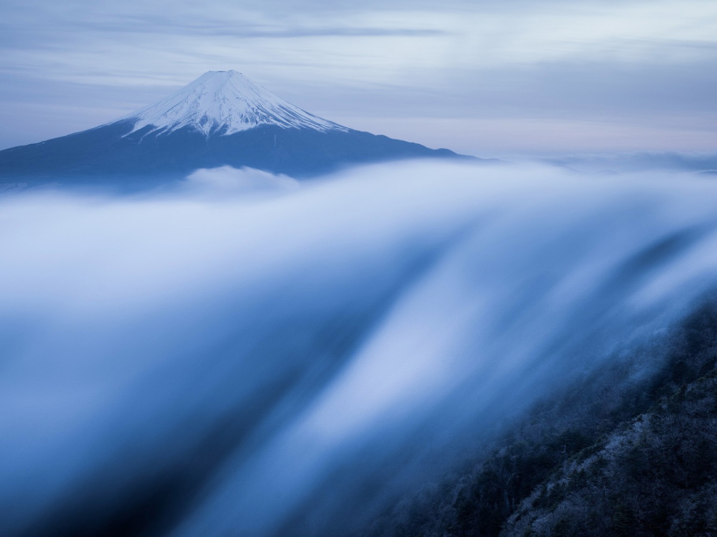 The mist flows down the mountainside, Japan