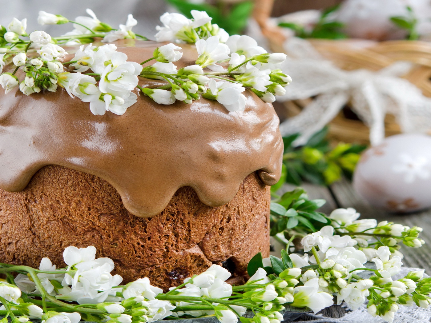 Beautiful Easter cake with chocolate icing and flowers