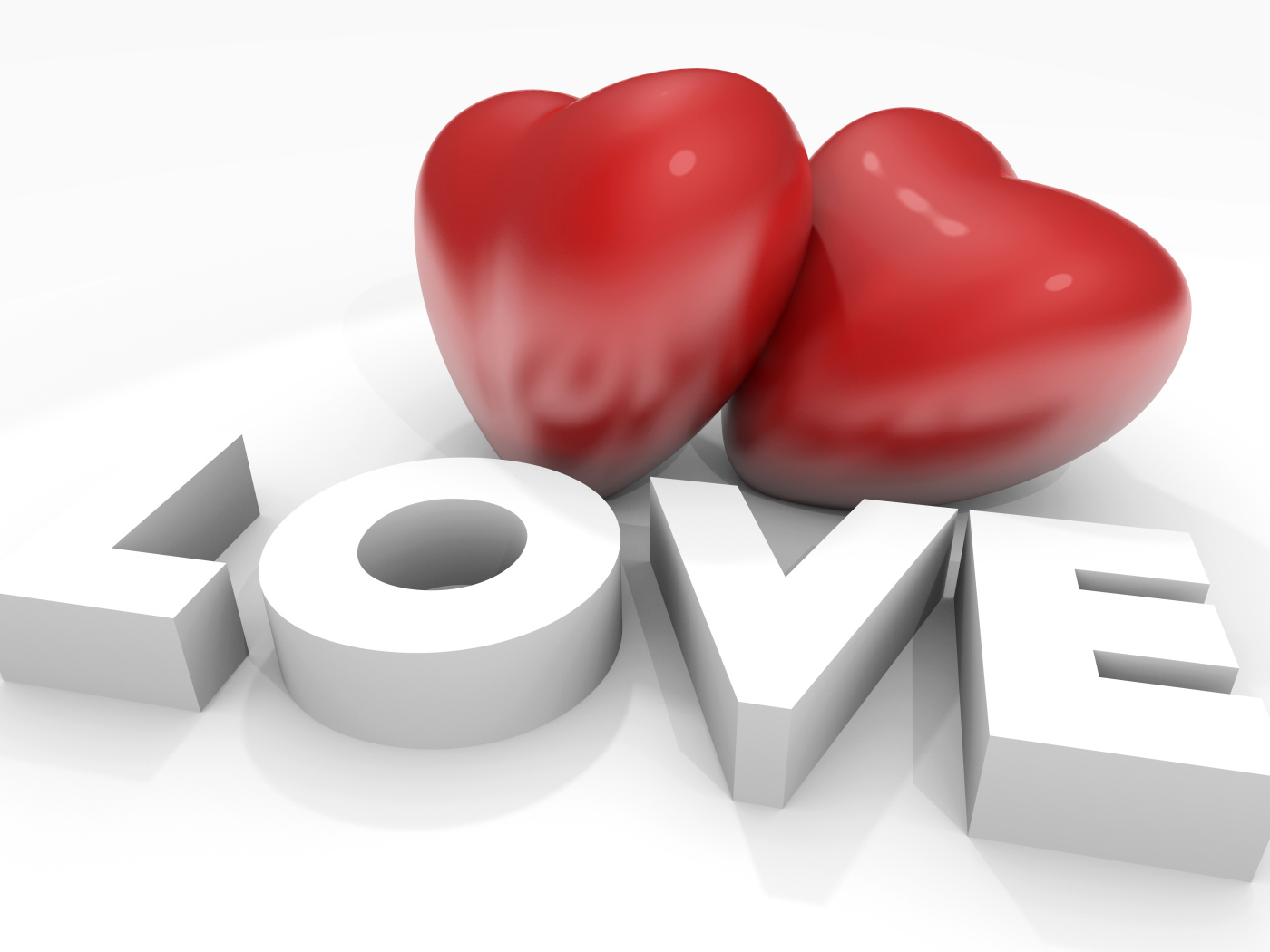 Два больших красных сердца с надписью Любовь на белом фоне, на 14 февраля