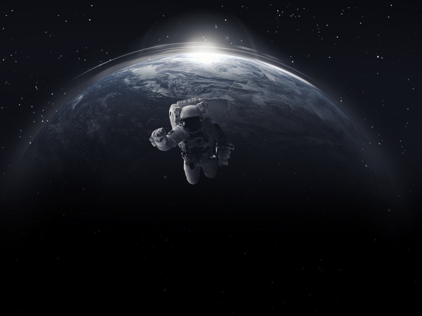 Астронавт в открытом космосе на фоне планеты земля 