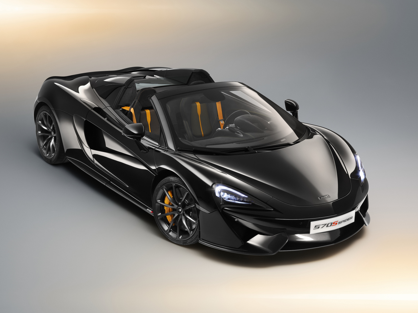 Черный автомобиль кабриолет McLaren 570S Spider, 2018