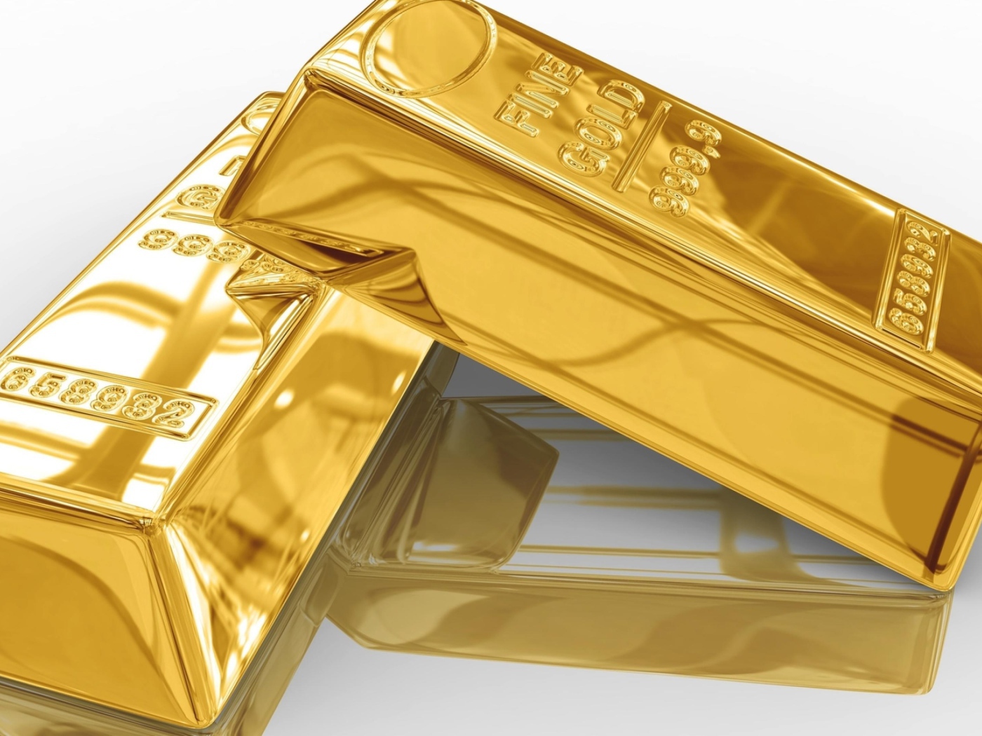 Два больших слитка золота отражаются в поверхности 