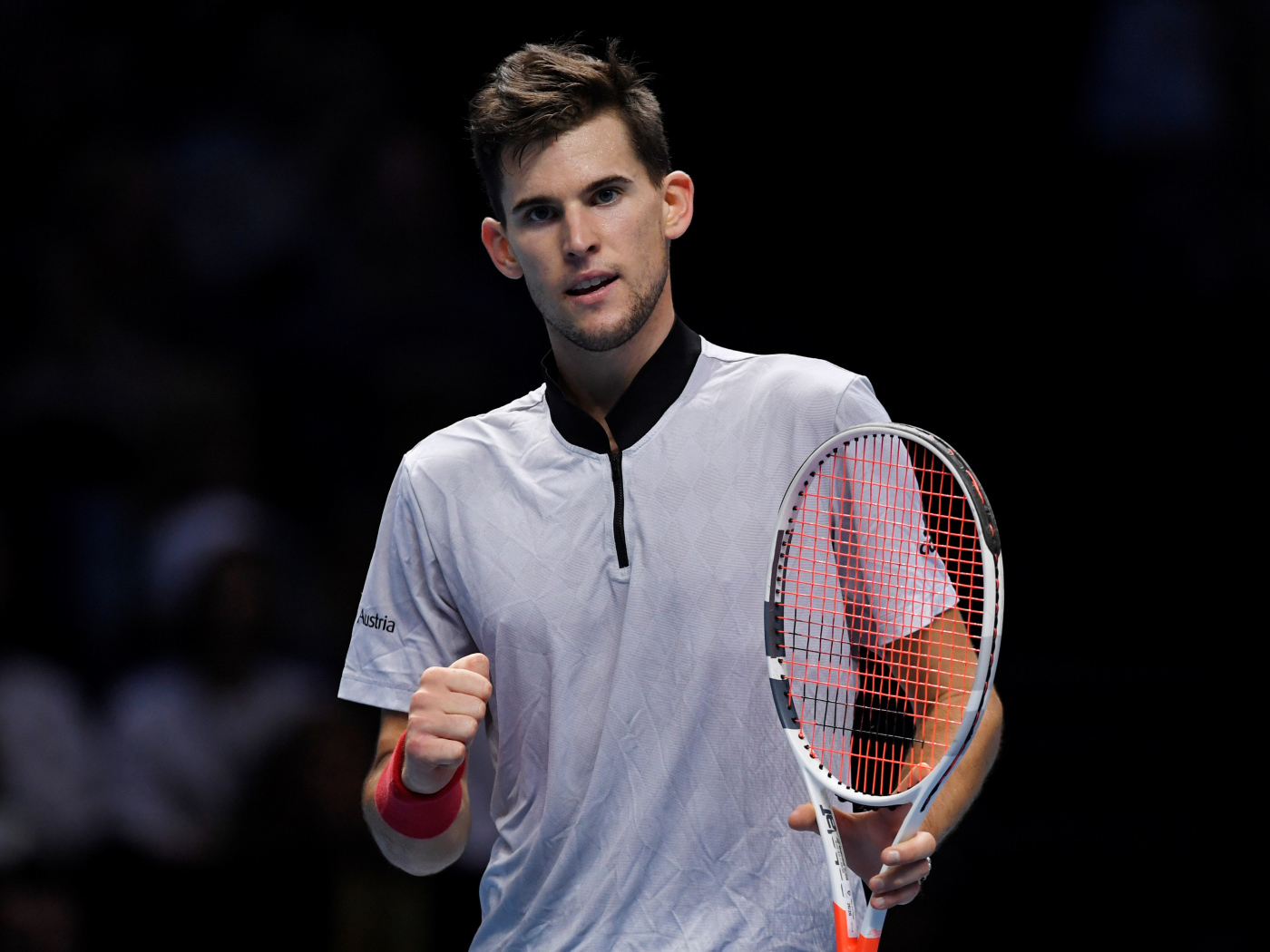 Австрийский теннисист Доминик Тим с ракеткой