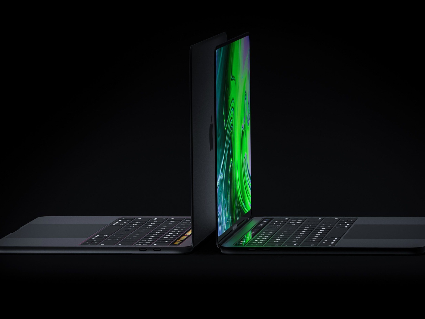 Два новых MacBook Pro от Apple, 2019 года на черном фоне